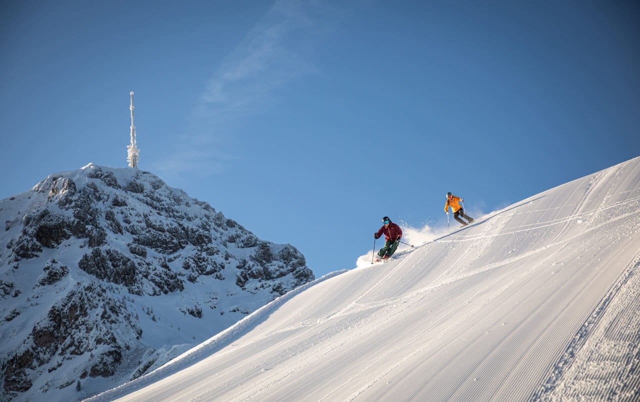 Fun on the slopes of the Harschbichl with a view of the Kitzbueheler Horn in St. Johann-in-Tirol