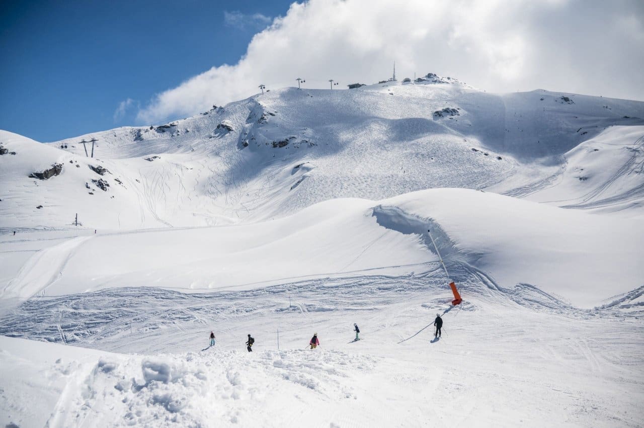 Skiing in Les Menuires in the heart of Les 3 Vallees. Credit Vincent Lottenberg and OT Les Menuires