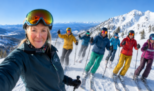 Katy Ellis leading a group of skiers