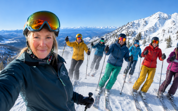 Katy Ellis leading a group of skiers