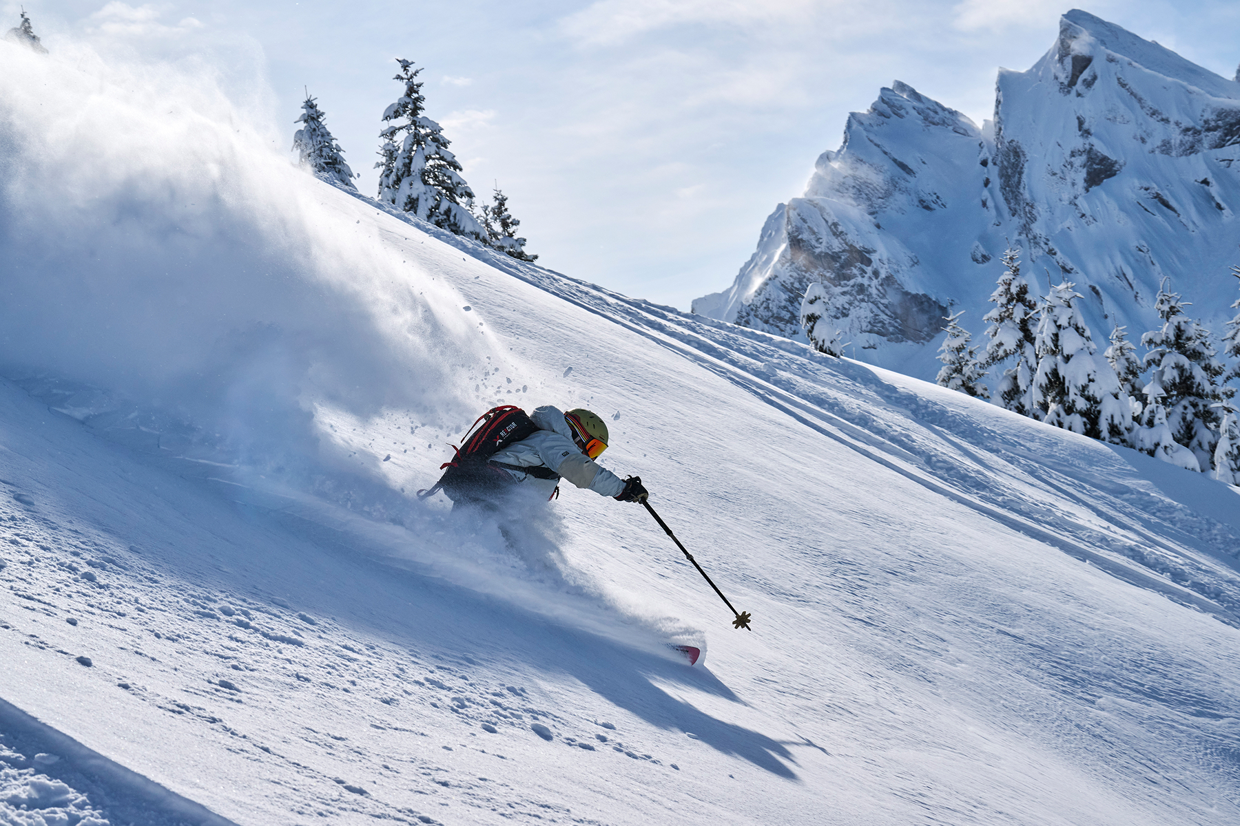 Skier enjoying off piste terrain on an All Mountain holiday